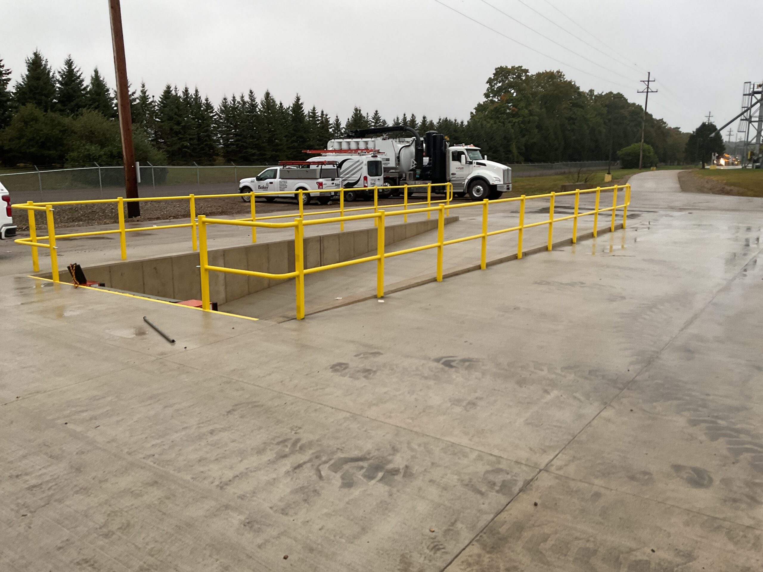 Concrete Truck dock with yellow metal railing